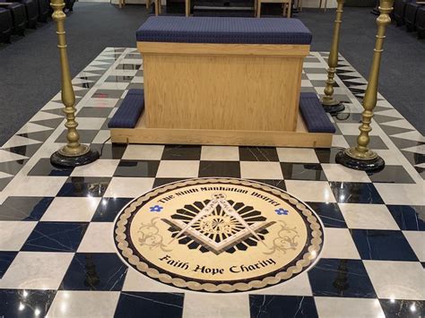The two pillars. . Black and white checkered floor masonic meaning